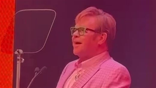 Sir Elton John says he's 'still a happy gay man' in emotional speech
