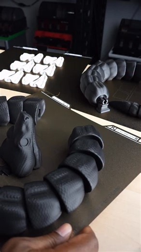 PrintedAF on Instagram: "As soon as I saw this boa model from @rakiboxstls , I knew it had to be scaled up… and wow, it did not disappoint. This giant boa was printed on our Bambu Labs H2S, and the detail at this size is unreal — from the texture to the glass eyes, it’s an absolute showstopper. This one already has a home 🖤 But keep an eye on the site… more big builds like this are definitely coming. Would you go giant or keep it standard size? 👀👇 #PrintedAF #3DPrinting #BambuLab #H2S #RakiDe