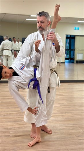 Ray Morcomb on Instagram: "The standing sumo stretch helps with kicks by improving inner thigh, groin, and hip flexibility, which is crucial for increasing the range of motion needed for high and side kicks. This can lead to higher, more comfortable, and safer kicks by strengthening the muscles and improving hip mobility 🥋📈 #sumo #stretch #mobility #kick #striking #karate #mma #muaythai #coach"