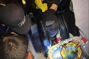 Florida firefighters rescue woman with foot caught in massage chair