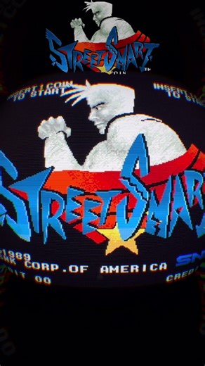 Street Smart is a 1989 SNK arcade fighting game where players fight through a series of opponents in a tournament to win money, glory, and a girl, featuring simple eight-directional movement and basic punches, kicks, and special moves in enclosed arenas. #arcade #fyp #1980s #retro #fypシ