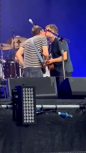 Damon Albarn kissing Graham Coxon on stage at a blur concert. #live #kiss