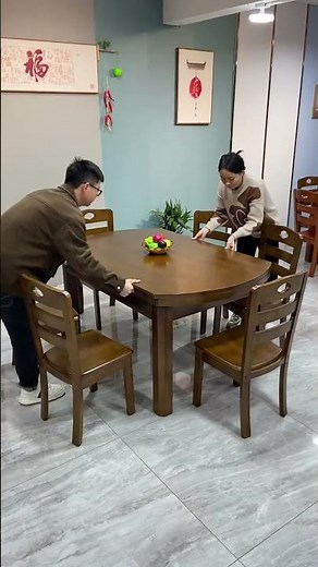 This is a solid wood extendable round dining table set with chairs.dj