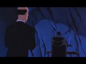 Batman puts on his Mask