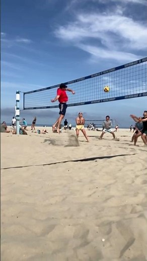 Beach volleyball attack. When playing beach volleyball, you need to react quickly to a tight set.