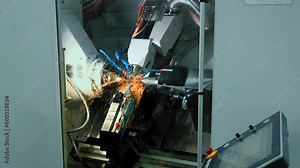 Automated Machining Equipment With CNC Control Panel Used For Metal Processing At Industrial Plant. Automated Equipment For Metal Machining. Automated Production Equipment. Metalwork Machining