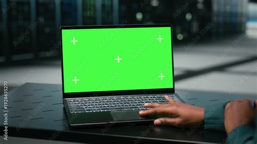 Green screen laptop, debugging system errors and technician in data center uses AR tech visualization. Running diagnostics, mockup notebook and expert in server farm with wireframe mesh gear, camera B