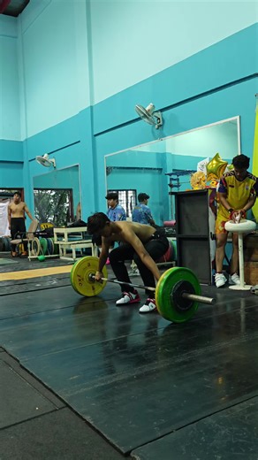 Weightlifting Training Session with Coach