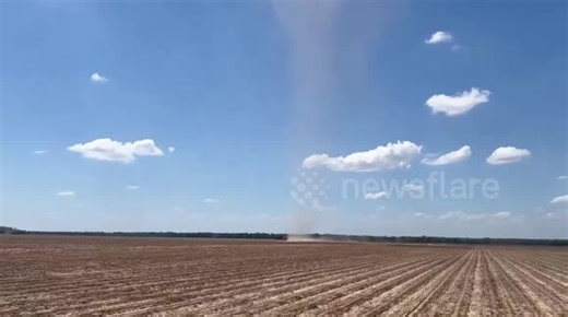 Dust devil tornado tears across field in Arkansas