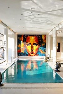 Modern Luxury Indoor Pool with Artistic Elegance