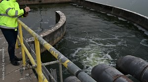 Environmental engineers work at wastewater treatment plants,Water supply engineering working at Water recycling plant for reuse