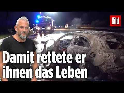 Ersthelfer befreit zwei Menschen aus brennendem Auto | Heftiger Crash auf der A9