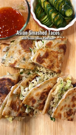 Mama Linda on Instagram: "✨ Comment “recipe” and I’ll send you the full recipe for these Asian Smashed Tacos with Green Onion Pancakes! Make sure you’re following me. DMs might not go through otherwise. Ever tried using frozen green onion pancakes as a taco shell? Total game changer 🔥 Crispy golden deliciousness straight from your freezer. These smashed tacos are packed with flavorful ground chicken, fresh and tangy Asian slaw, and a drizzle of sweet chili sauce. Crispy juicy tangy and savory a