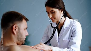 "Healthcare professional examining a patient with a stethoscope in a medical setting."