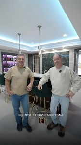 Raise a glass🍸to craftsmanship and style! This custom-built bar is the centerpiece of our latest basement and has a sleek design that brings a touch of class to the room. • • #craftsmanship #luxurydesign #bar #homebar #basementbar | Finished Basements NJ