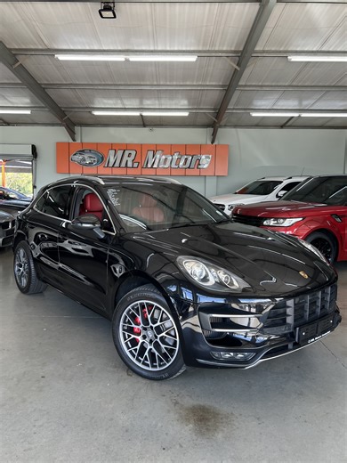 2014 Porsche Macan Turbo | Auto • 75 000 km • Petrol | Automatic • Full service history • All-wheel drive (AWD) • Sunroof • Xenon & LED lights • Full red leather interior • Paddle shifters • Park Distance Control (PDC) • Reverse camera • Cruise control • Climate control • BOSE sound system • FULL frontal VPS protection Finished in Black and in excellent condition. Powered by a 294kW engine, this luxury performance SUV delivers thrilling power while maintaining everyday comfort and practicality. 