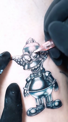 🎨 Unveiling a masterpiece! 🌟 Check out our resident artist @andresmakishi latest creation – a mind-blowing micro-realism Krusty Tattoo! 🤯🔍 Specializing in realism & micro-realism, Andres is now taking bookings for April 2024. Secure your spot for an unforgettable ink experience! 📆🖋️ #MicroRealismTattoo #tattooshop #BookNow #inknationstudio | Inknation Studio