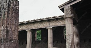 Corinthian columns in Pompeii's Gladiators' Barracks, Italy