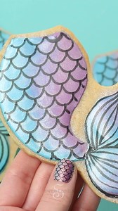16K views · 227 reactions | I made these mermaid tail cookies using the supplies from my Starfish and Seashell Cookie Kit and a few custom templates. You can see the full supply list with links to get the supplies online here: https://www.sweetambs.com/tutorial/mermaid-tail-cookies-with-royal-icing/ | SweetAmbs | Facebook