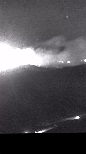 28K views · 395 reactions | Interstate 5 has been reopened north of Santa Clarita, CA with the Hughes Fire burning on the mountain above the moving traffic. 6 helicopters are battling this blaze tonight | Reed Timmer Extreme Meteorologist | Facebook