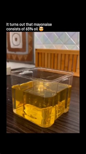 Entertainment | Business | Tech on Instagram: "A 15 second clip shows homemade mayonnaise coming together in seconds with an immersion blender. Oil and egg yolk suddenly emulsify into a thick, creamy sauce, surprising people when they realize mayo is mostly oil. That’s not a trick, it’s the recipe. By definition, mayonnaise is at least 65 percent oil, with egg yolk, a little water, and acid holding it all together. The comments turn into a mix of food science, nutrition reality checks, and jokes