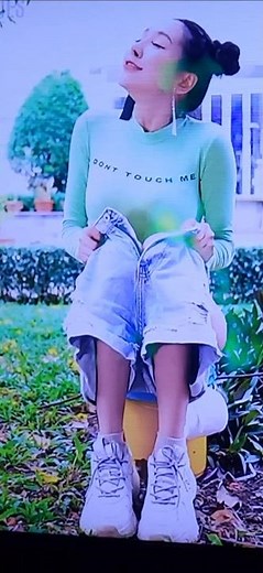 girl pooping on the bucket