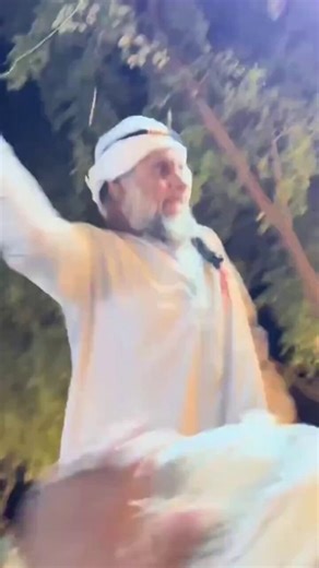 Islamic scholar destroys musical instruments because Allah does not like music.