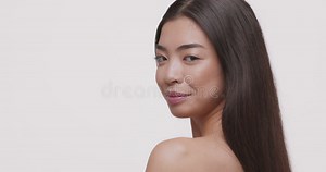 Flirty Asian Girl Turning To Camera from Back Stock Footage - Video of camera, girl: 195165974