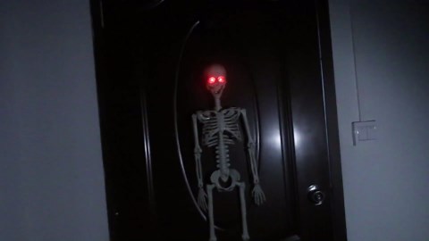 Halloween Hanging Posable Skeleton - 3FT Prop Skull with LED Glowing Eyes and Creepy Shrilling Sound - Sound Activated Outdoor Halloween Decorations Skeleton Decoration