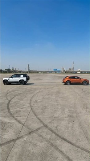 Land Rover Defender vs Porsche Macan EV Tug of War – The Winner Will Shock You! 😱 #shorts