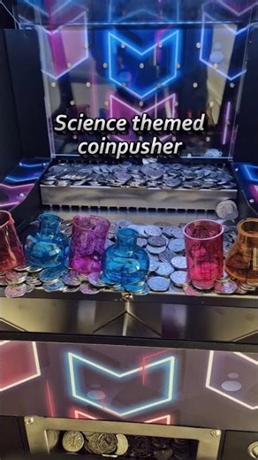 We love the science beaker setup on this coinpusher!