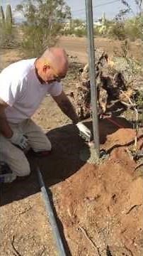 Chain Link Fence Post Installation How to - Part 2 - Pouring footer, installing post, aligning post.