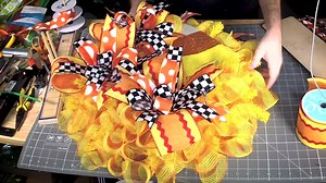 24K views · 553 reactions | More candy corn, y'all! This fun wreath is bold and vibrant and sure to be a show-stopper. What do y'all think about it?! Let us know below! And find the longer tutorial here: https://www.youtube.com/watch?v=3comJgjYPp8 | DecoExchange | Facebook