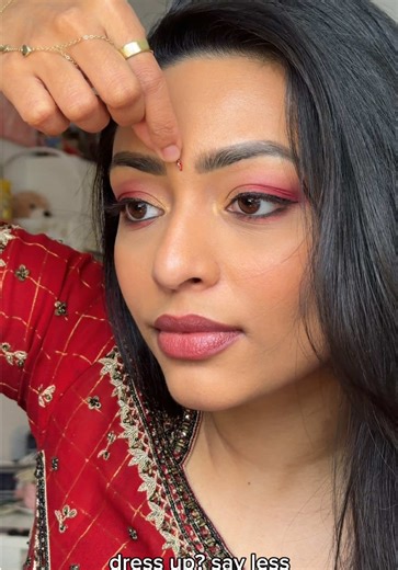 Colorful Eyeshadow and Bindi: A Stylish Statement