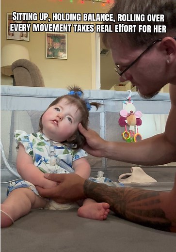 Remi Practices Sitting Up & Balance with Physical Therapy