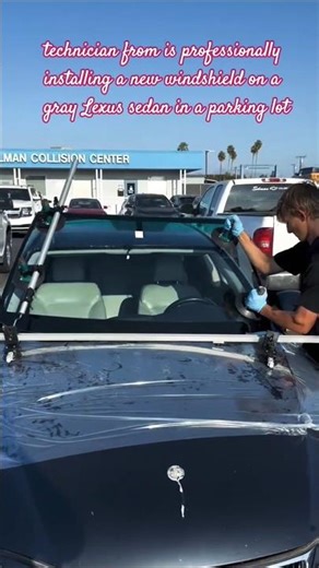A professional technician installs a new windshield on a car using specialized tools. #technology