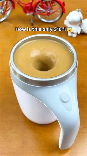 Gadget It Now on Instagram: "Comment "Mug" for the link or find in my Bio! This Automatic Magnetic Stirring Coffee Mug goes everywhere I go (no literally) 😅 Take this from your kitchen → desk → car → gym without missing a beat. 🌪️ Perfect for: 📊 Back-to-back meetings 🚗 Morning commutes 💻 WFH coffee breaks 🏋️ Pre-workout fuel One button. Zero effort. Maximum productivity. Please note: you must be following me @gadgetitnow.us for links to appear! #amazonusa #selfstirringmug #coffeelovers #pr