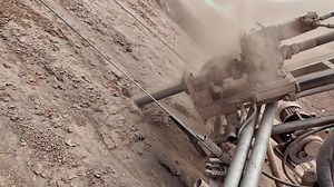 A portable hydraulic dth drilling rig working on a slope #drillingrig #dth #rockdrilling #soildrillingrig