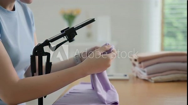 Young adult woman asia people live stream vlog talk review old used shirt second hand sell. Go green happy eco care reduce zero waste fabric issue sale online app side hustle reuse clothes store shop.