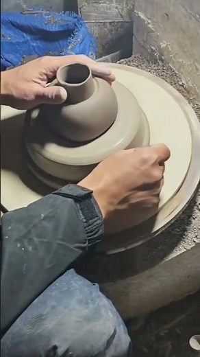 The process of making a jar from clay using manual methods is carried out by experts.