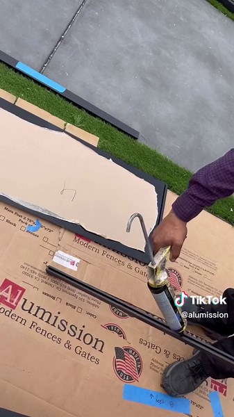 Modern Telescopic Sliding Gate Design with Black Aluminum and Acrylic Glass