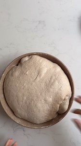 Pre shaping of a double dough made with a mix of 4 different flours, 84% hydration Pre shaping is useful when you make a large pieces of dough that requires dividing. It gives a uniform pre shape, which facilitates the final shaping If dough is quite stiff, and has lots of tension, pre shaping should be light, just going round 2-3 times. Too much handling and tightening will affect the crumb, leading to a denser one If the dough is still quite slack, the pre shaping can be a bit more thorough. Y