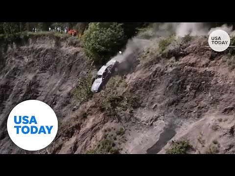 Cars launch off 300-foot cliff during Alaska town's annual tradition | USA TODAY