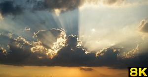 Rays of Sunlight Bursting Through Dramatic Clouds