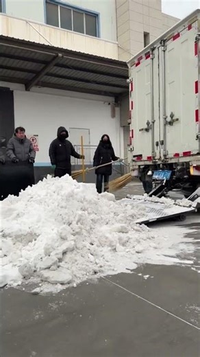Snow shoveling with the truck lift tailgate