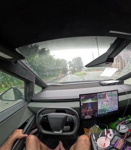Cybertruck FSD V14.3.6- in the rain - emergency vehicle response and poor design flooded underpass