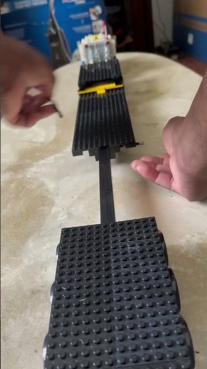 Showing how my extendable Tri axle step deck trailer works