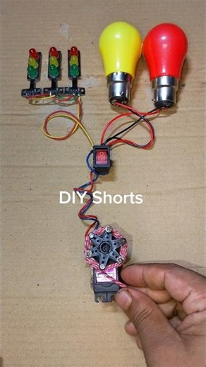 Turn on a Metal Gear Motor Powering Into Two LED Light and 3 Traffic Light #dcmotor #tech #shorts