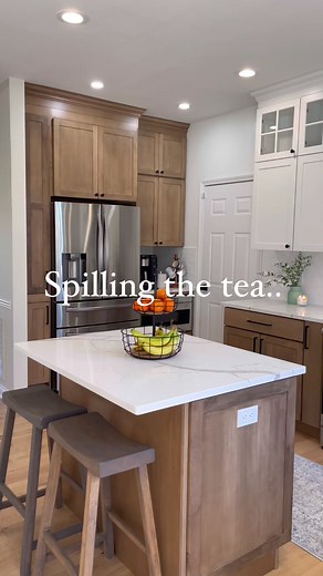 136K views · 802 reactions | Kitchen cabinet details ✨ • lowers are Husk stain on Maple wood • uppers are Dove White. These are by KraftMaid Cabinetry!! What other kitchen questions do you have?!#transitionalfarmhouse #woodkitchen #woodandwhitekitchen #blackrangehood | Liz Pacini | Facebook