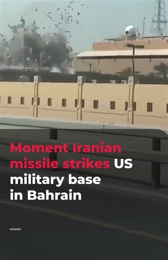 Video shows the moment an Iranian missile struck ajUnitedeStates military base in Bahrain. The strike was part of Iran's retaliation for Israel-US attacks across Iran.